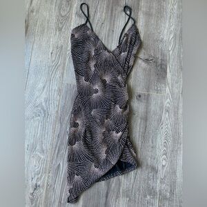 Olive Tree beaded sparkly asymmetrical low cut, low back dress